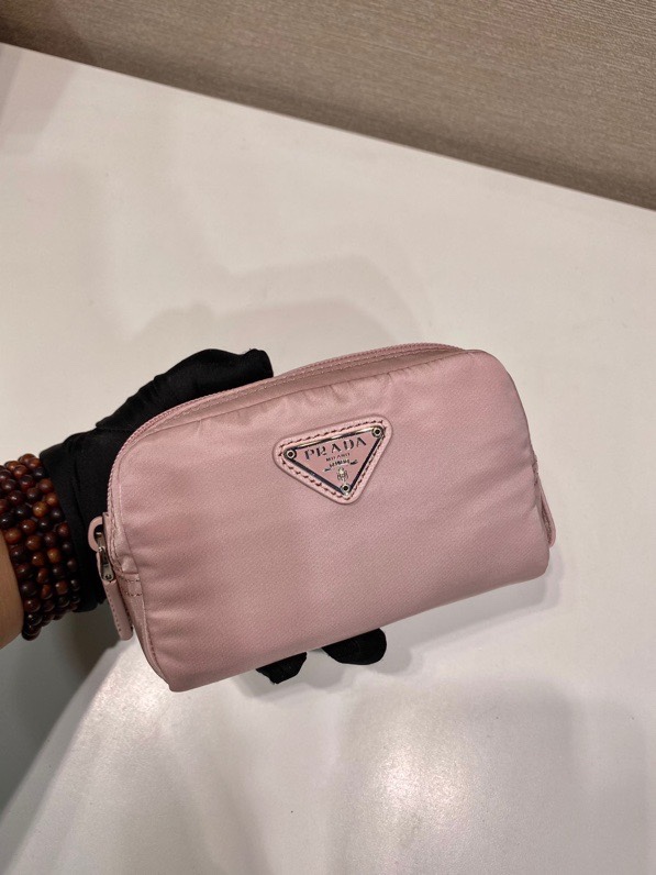 Pra*a clutch bags